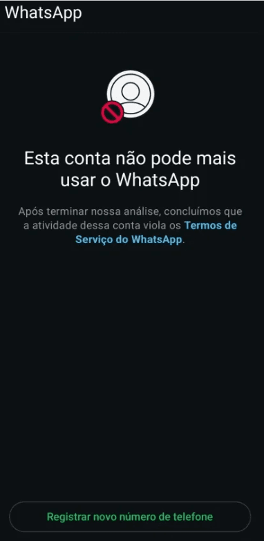 Tela do WhatsApp informando que a conta não pode mais usar o aplicativo por violação dos Termos de Serviço, com a opção de registrar um novo número de telefone
